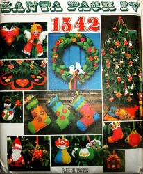 1542 VOGUE SANTA IV 10 TREE ORNAMENTS, STOCKING, WREATH, SKIRT PATTERN UNCUT