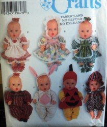 7430  SIMPLICITY 13-16'' BABY DOLL DRESS, SUNSUIT, HAT, BOOTEES PATTERN